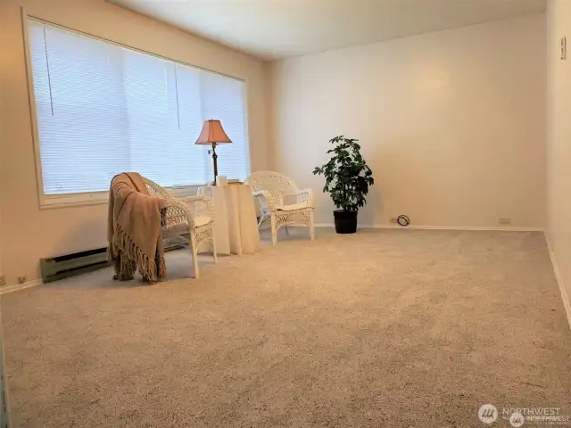 Living Room with expansive windows allowing gorgeous sunset viewing