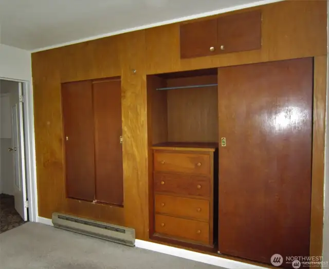 Built in closets and storage in bedroom