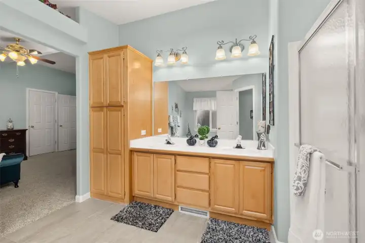 Plenty of storage and counter space in this well-appointed bath.