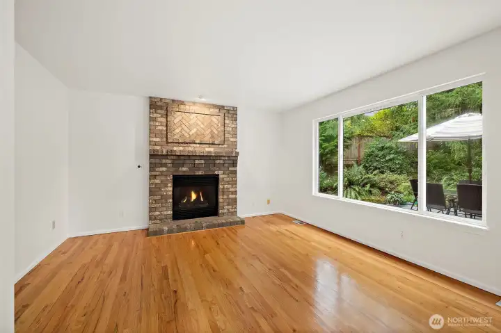 Spacious family room with beautiful gas fireplace.