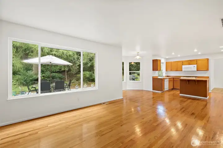 Looking towards the kitchen area and a glimpse of hte backyard deck.