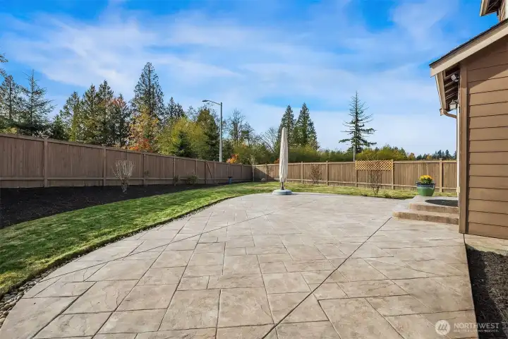 Expansive patio os perfect for entertaining, whether dining alfresco or snuggling up around a fire pit.