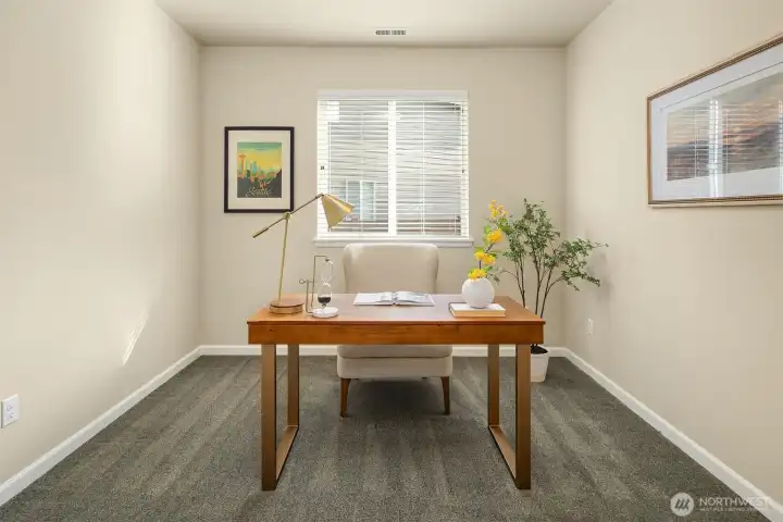 Main floor office/bedroom/flex space, across the hall from powder room with shower.