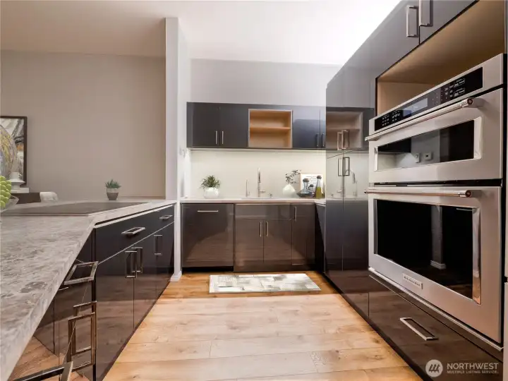 Kitchen with abundant counters & cabinets with soft-close (virtually staged)