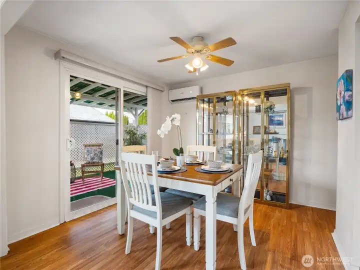 Dine with friends inside or outside. The large sliding doors in blurs the lines.