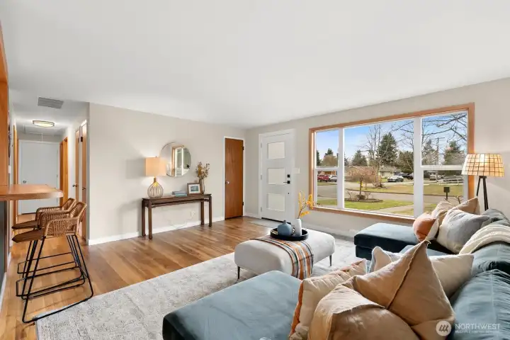 The main living space sits off entry with large picture window.