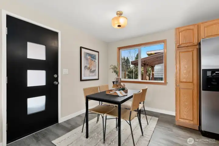 Designated dining area - and door to backyard.