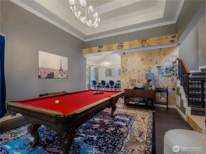 Billiard/entertainment room looking into formal dining area
