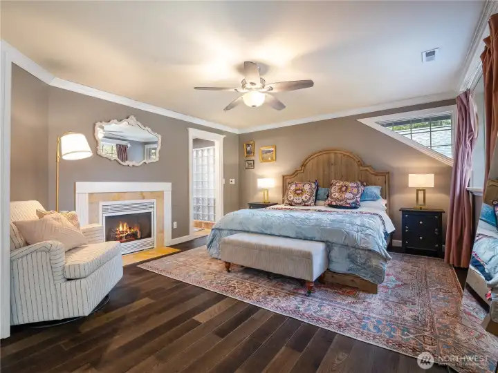 another propane fireplace next to primary bath