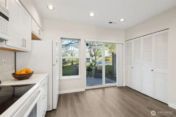 The views of the backyard are so relaxing from the kitchen space, and close by laundry makes taking care of chores tireless.