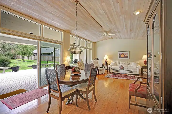 High Transom Windows and Wall-of-Glass creates an incredible Indoor/Outdoor Setting~