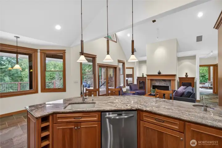 Spacious kitchen on main level with granite counters