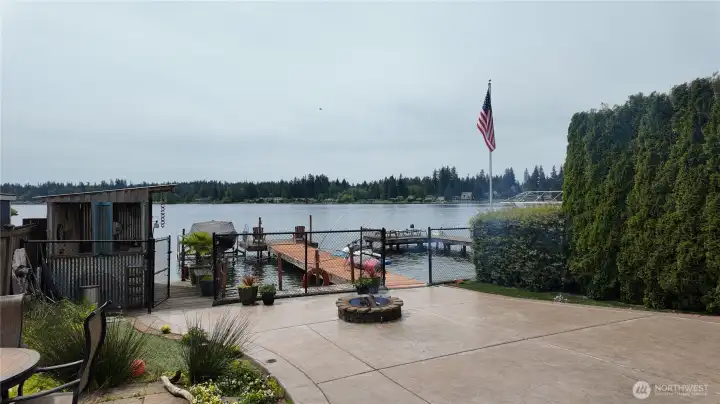 Fenced entirely in the back yard. Gates to the dock and bar.