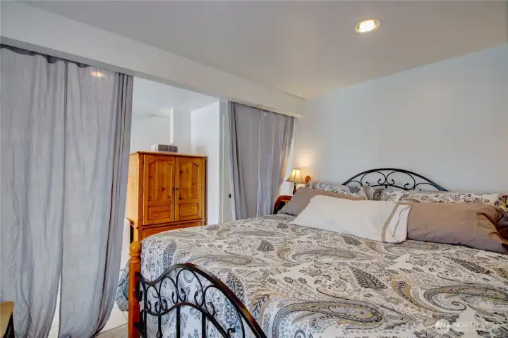 Downstairs family room being used as a second bedroom.
