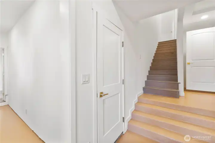 Stairs to secluded primary suite Stairs to secluded primary suite