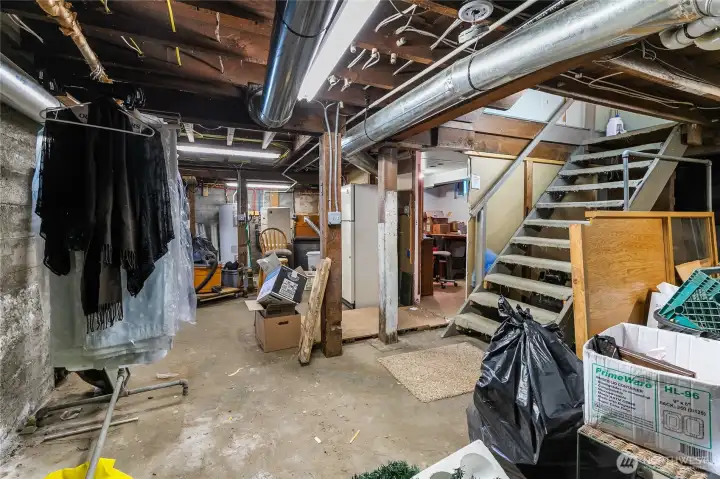 Stairs going to the basement. Easy access to utilities and additional areas for storage or other purposes. Stairs going to the basement. Easy access to utilities and additional areas for storage or other purposes.