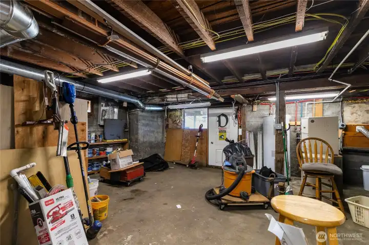 Work space, door to get outside. Hot water tank. Everything is open for easy access. Work space, door to get outside. Hot water tank. Everything is open for easy access.