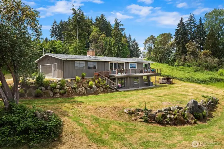 The home is centered on .8 of an acre. Plenty of room, and privacy) for all of your outdoor hobbies!!