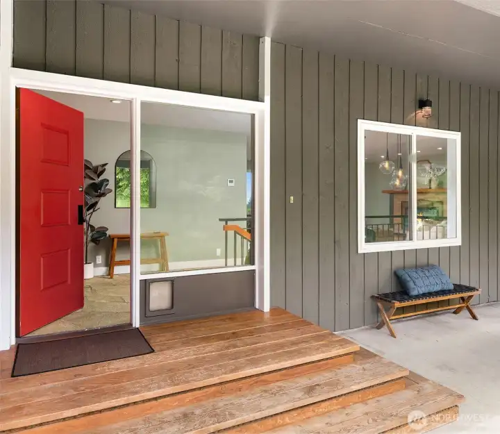 A spacious, covered front patio keeps you dry on rainy days when you need to bring the groceries in from the garage.