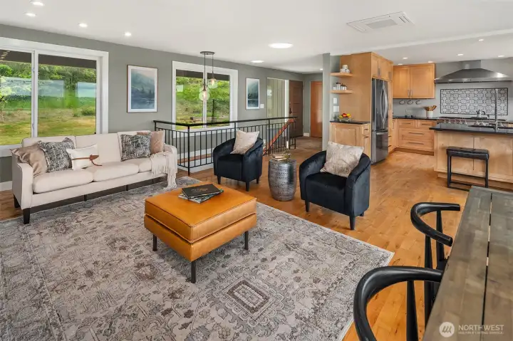 Solid wood doors, hardwood floors, plus the wood kitchen cabinetry - a beautiful balance of wood accents throughout.