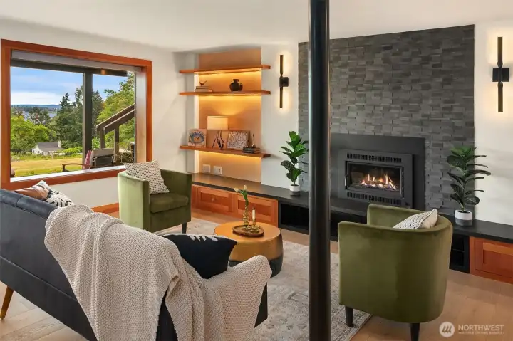 Head downstairs to the fully renovated family room with a custom created and built hearth plus a Lopi wood insert. The classy, warm wood accents continue on this level.