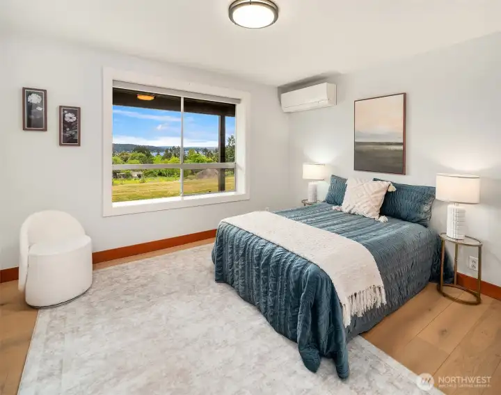 The third bedroom is on the lower level. It is a quiet retreat from the bustle of upstairs. Lounge in the comfort of your personal heating and cooling system.