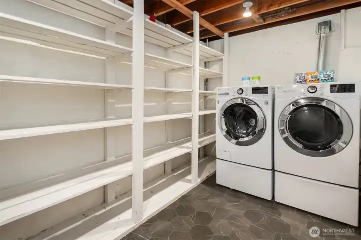 A very spacious laundry room is on the lower level. Check out that storage!!
