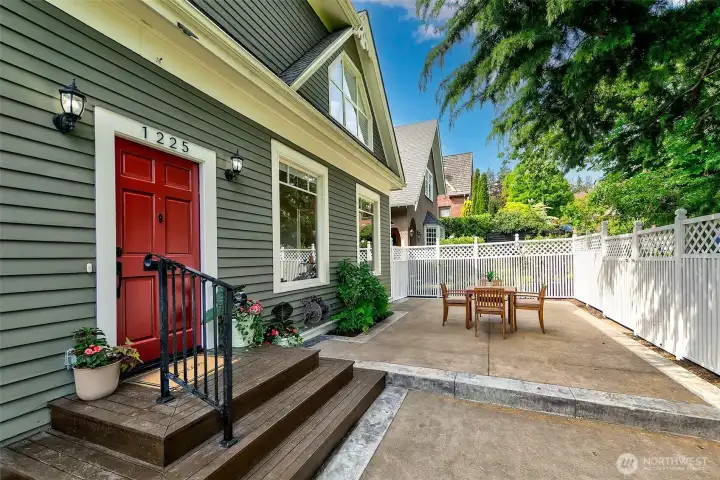 Tucked back from the street an oversized patio welcomes you.