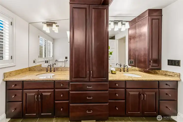 Upper level bathroom includes dual vanities with lots of storage