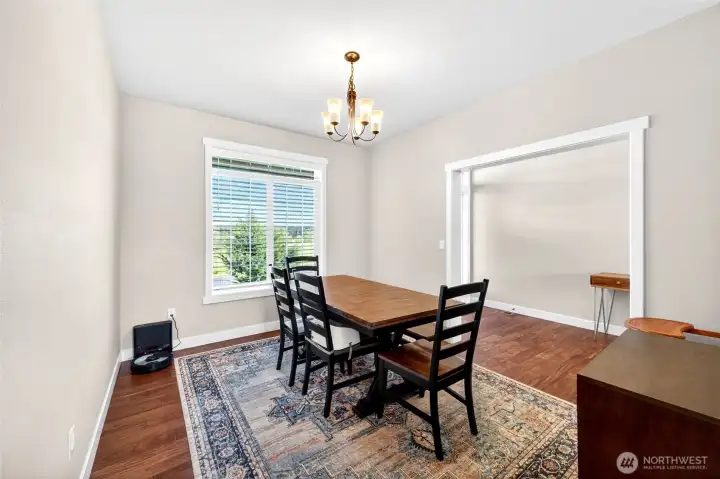 Dedicated dining room offers flexibility for holiday gatherings, dinner parties, or an additional home office space.