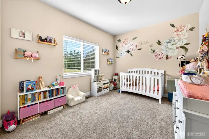 Bright and spacious secondary bedroom offering flexibility for guests, hobbies, a nursery, or home office needs.