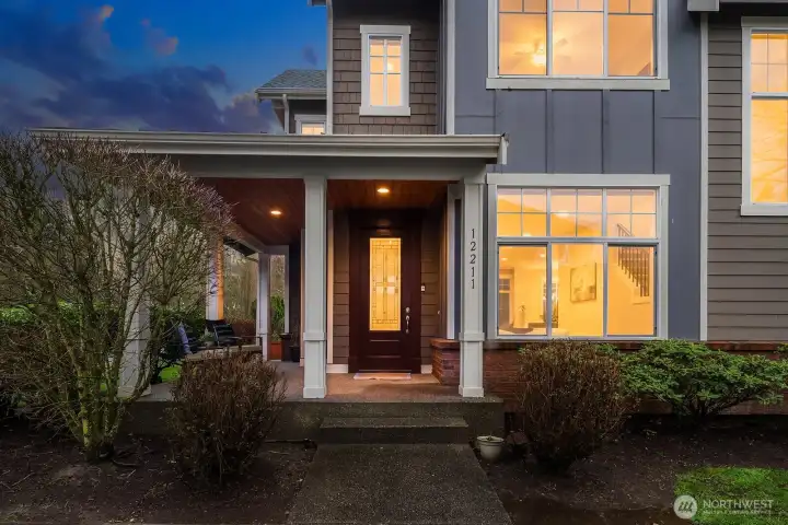 This stunning Craftsman-style home makes an unforgettable first impression at dusk, showcasing beautiful curb appeal with its classic architecture, warm glowing windows, and lush mature landscaping on a coveted corner lot in Sycamore Park. This stunning Craftsman-style home makes an unforgettable first impression at dusk, showcasing beautiful curb appeal with its classic architecture, warm glowing windows, and lush mature landscaping on a coveted corner lot in Sycamore Park.
