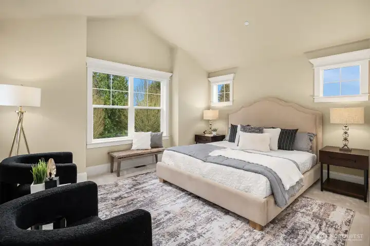 The serene primary suite is a true retreat, offering a spacious and light-filled layout with large windows, warm neutral tones, and ample room for a generous furniture arrangement — a peaceful haven at the end of every day. The serene primary suite is a true retreat, offering a spacious and light-filled layout with large windows, warm neutral tones, and ample room for a generous furniture arrangement — a peaceful haven at the end of every day.