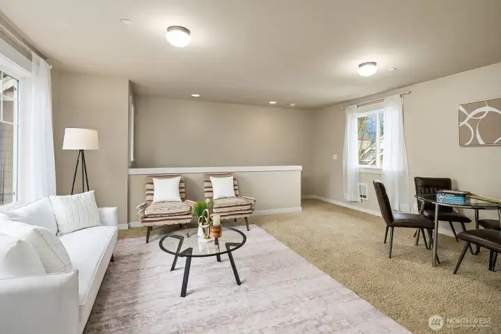 This angle of the ADU showcases the open and well-proportioned living and dining areas, with soft neutral tones and ample natural light creating a comfortable and welcoming atmosphere for any occupant. This angle of the ADU showcases the open and well-proportioned living and dining areas, with soft neutral tones and ample natural light creating a comfortable and welcoming atmosphere for any occupant.