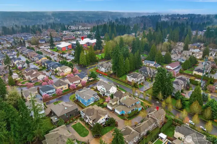 A sweeping aerial perspective showcases the home's prime English Hill location, nestled within a vibrant and well-connected Redmond community surrounded by mature trees, parks, and convenient access to everything the Eastside has to offer. A sweeping aerial perspective showcases the home's prime English Hill location, nestled within a vibrant and well-connected Redmond community surrounded by mature trees, parks, and convenient access to everything the Eastside has to offer.