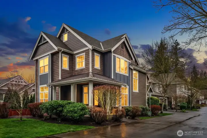 This stunning Craftsman-style home makes an unforgettable first impression at dusk, showcasing beautiful curb appeal with its classic architecture, warm glowing windows, and lush mature landscaping on a coveted corner lot in Sycamore Park. This stunning Craftsman-style home makes an unforgettable first impression at dusk, showcasing beautiful curb appeal with its classic architecture, warm glowing windows, and lush mature landscaping on a coveted corner lot in Sycamore Park.