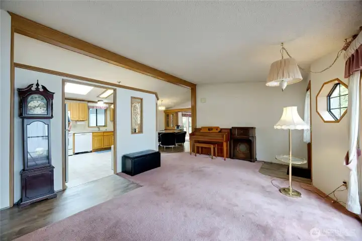 Entry, living room and convenient access to kitchen and dining areas Entry, living room and convenient access to kitchen and dining areas