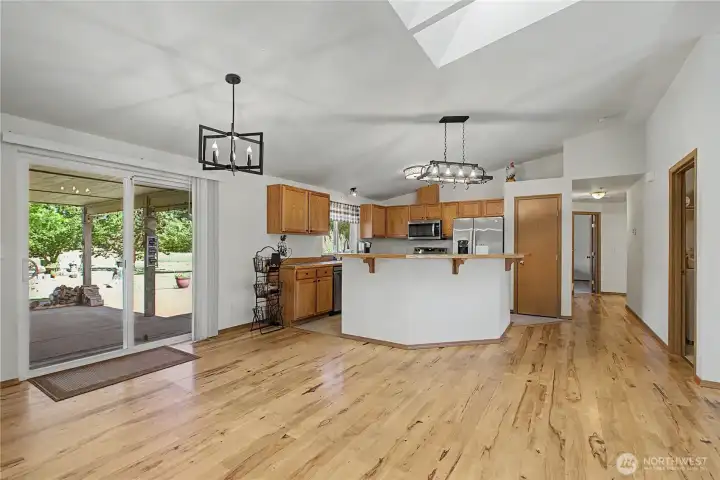 A look towards the kitchen from the dining area. Living room just to my Right. Nice hardwood flooring throughout the living areas and down the hallway. A look towards the kitchen from the dining area. Living room just to my Right. Nice hardwood flooring throughout the living areas and down the hallway.