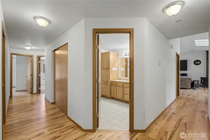 To the left heads to the guest bedrooms and the right heads back to the living areas. Guest/hall bath straight ahead. To the left heads to the guest bedrooms and the right heads back to the living areas. Guest/hall bath straight ahead.