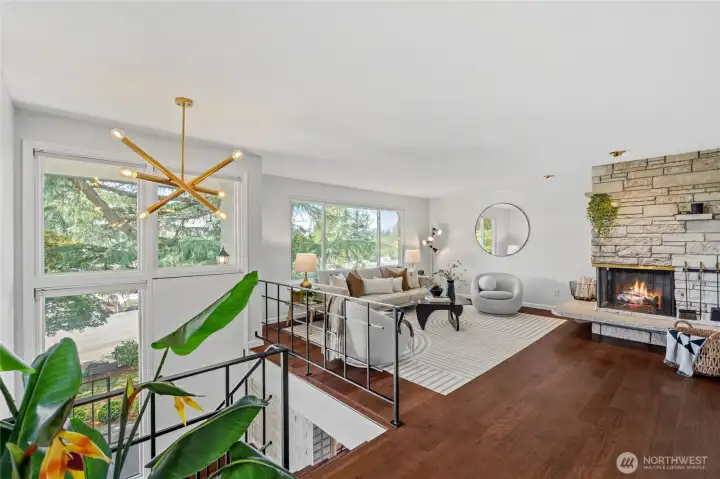 Expansive living room fills with natural light, showcasing timeless mid-century design. Expansive living room fills with natural light, showcasing timeless mid-century design.