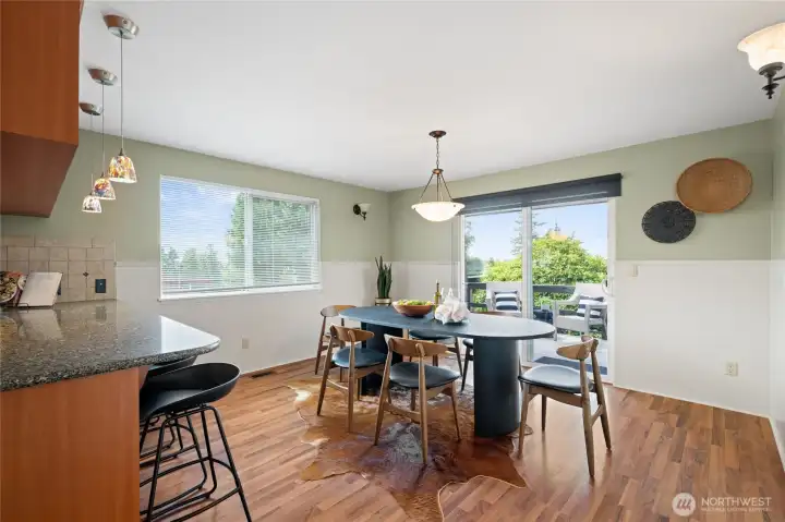 Generous dining area opens directly to the private deck for effortless indoor-outdoor entertaining. Generous dining area opens directly to the private deck for effortless indoor-outdoor entertaining.