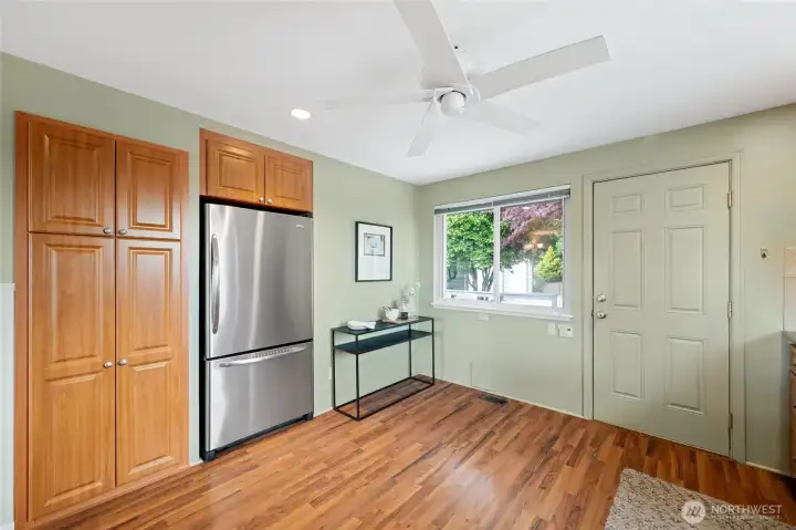 Convenient kitchen entry provides easy access while offering additional storage and workspace. Convenient kitchen entry provides easy access while offering additional storage and workspace.