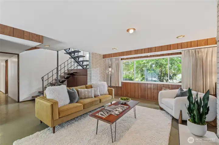 Inviting recreation room showcases timeless mid-century character with plenty of room to relax and unwind. Inviting recreation room showcases timeless mid-century character with plenty of room to relax and unwind.