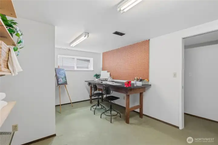 Utility Room also has a dedicated workshop with built-in workbench that offers the perfect space for crafts, repairs, or extra storage. Utility Room also has a dedicated workshop with built-in workbench that offers the perfect space for crafts, repairs, or extra storage.