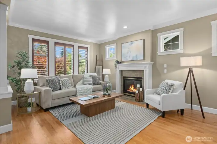 Large windows flood the living room and dining room with natural light Large windows flood the living room and dining room with natural light