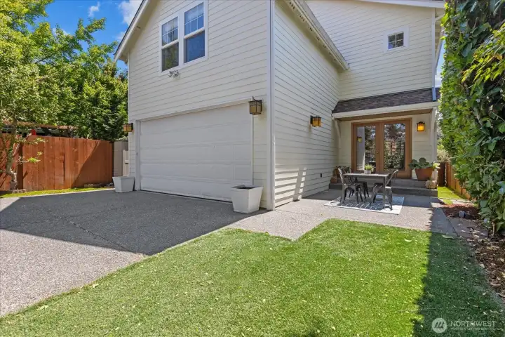 Fully fenced back yard with secure alley access Fully fenced back yard with secure alley access