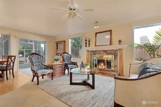 Family room and kitchen with eating nook open to the 15' x 10' Sun-room addition.