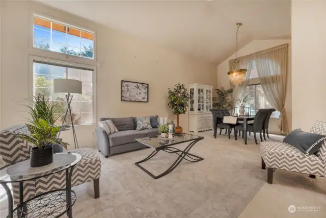 This, the living and dining room space is filled with natural light.