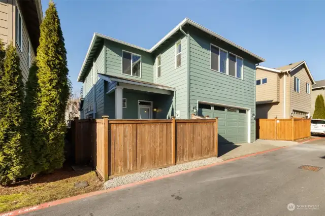 fully fenced and extra parking in front of garage