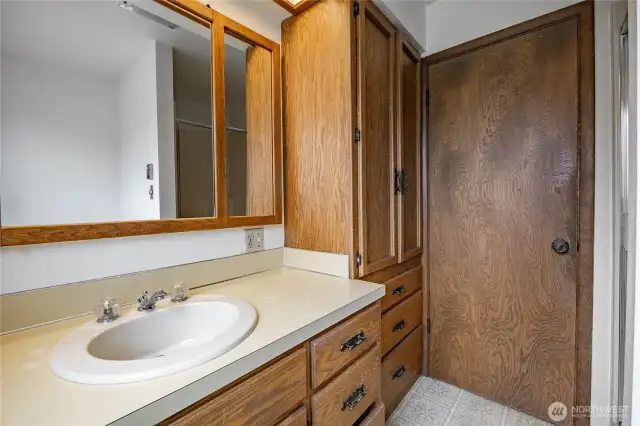 3/4 Bathroom by the kitchen and next to garage.